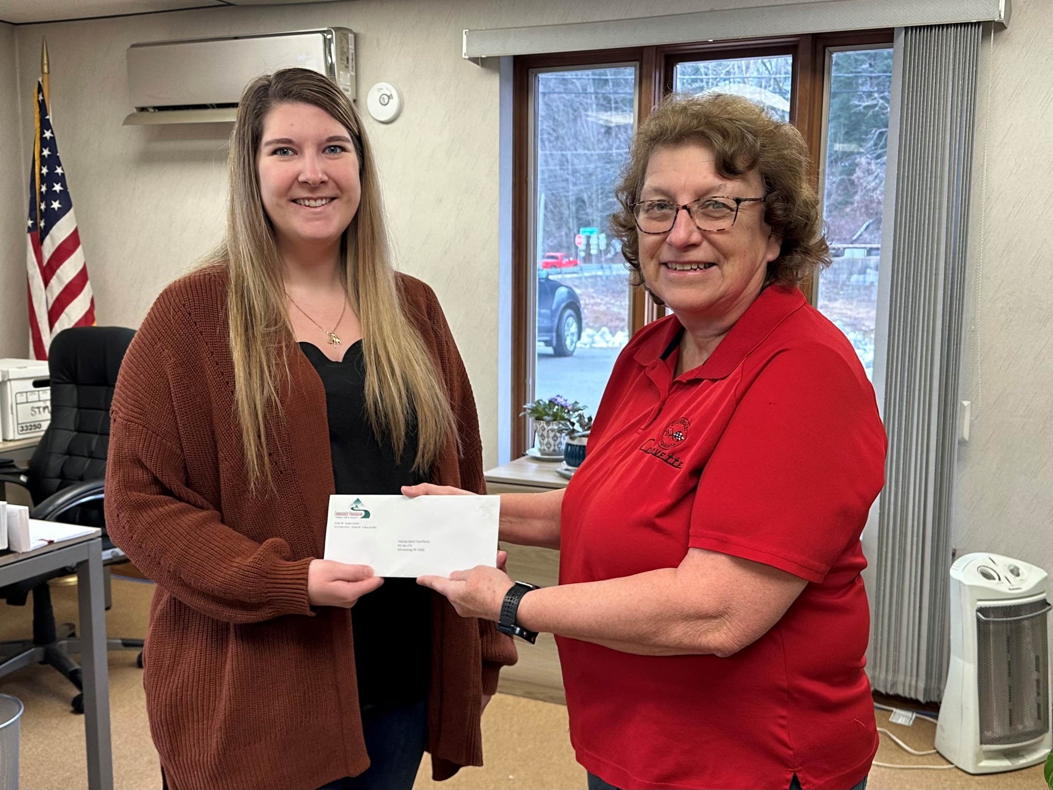 Women Who Care Member Allegretto awards grant to Helping Hands Food